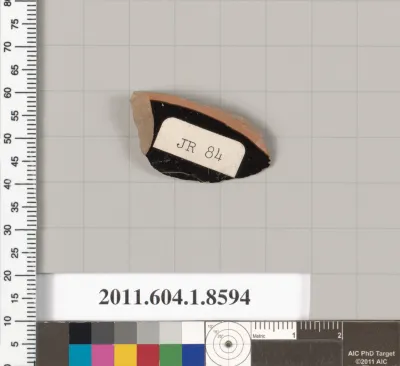 Terracotta fragment of a stemless kylix (drinking cup)