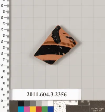 Terracotta fragment of a kylix: eye-cup (drinking cup)