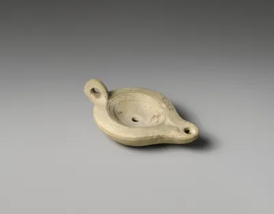 Terracotta oil lamp