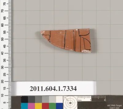 Terracotta fragment of a kylix (drinking cup)