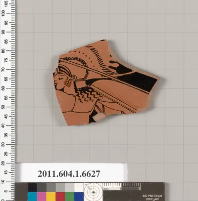 Terracotta fragment of a kylix (drinking cup)