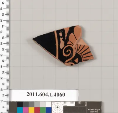 Terracotta fragment of a kylix (drinking cup)