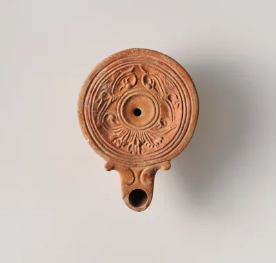 Terracotta oil lamp