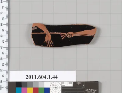 Terracotta fragment of a kylix (drinking cup)