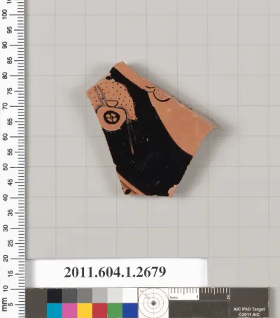 Terracotta fragment of a kylix (drinking cup)