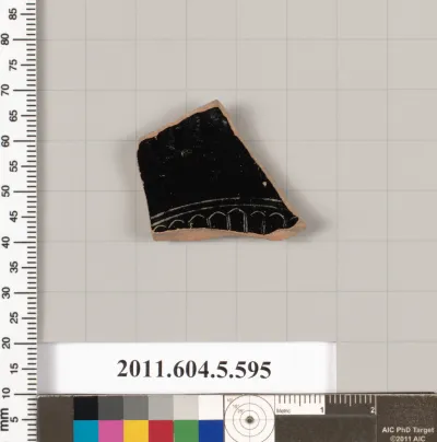 Terracotta fragment of a stemless kylix (drinking cup)