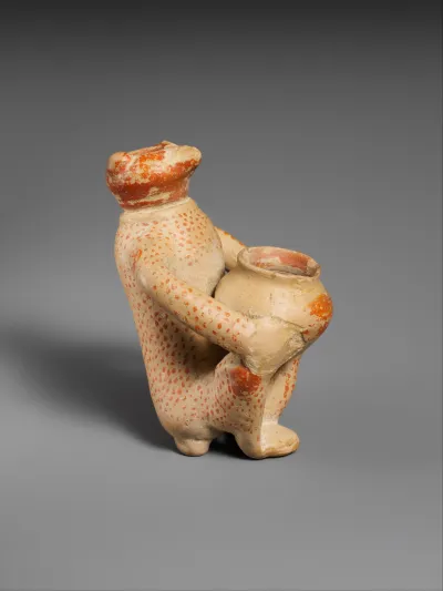 Terracotta vase in the shape of a monkey