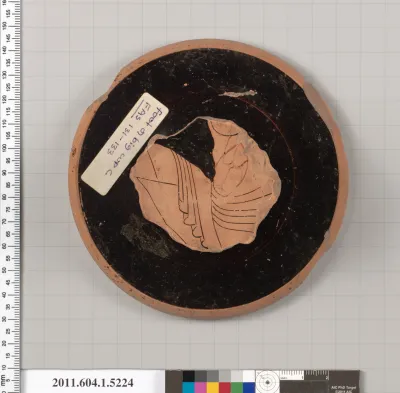 Terracotta fragment of a kylix (drinking cup)