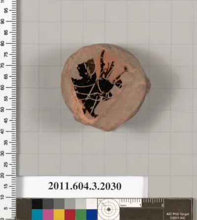 Terracotta fragment of a kylix (drinking cup)
