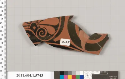 Terracotta fragment of a kylix: eye-cup  (drinking cup)