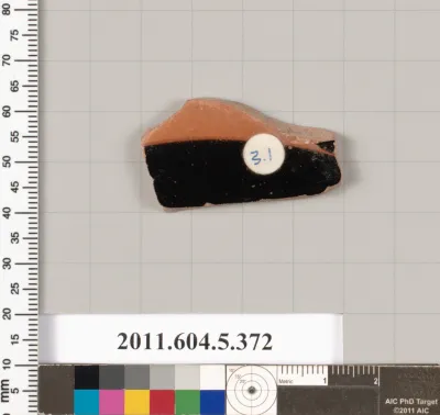 Terracotta fragment of a kylix (drinking cup)