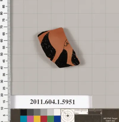 Terracotta fragment of a kylix (drinking cup)