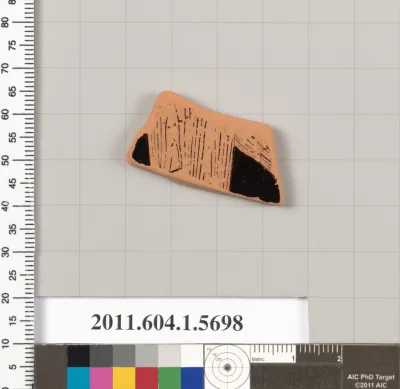 Terracotta fragment of a kylix (drinking cup)