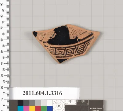 Terracotta fragment of a kylix (drinking cup)