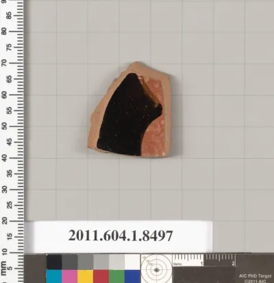 Terracotta fragment of a stemless kylix (drinking cup)