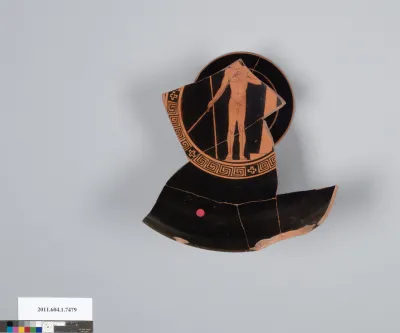 Terracotta fragment of a kylix (drinking cup)