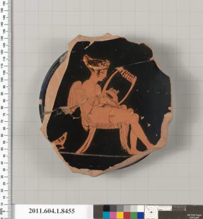 Terracotta fragment of a stemless kylix (drinking cup)