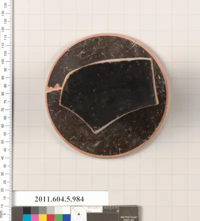 Terracotta fragment of a kylix (drinking cup)