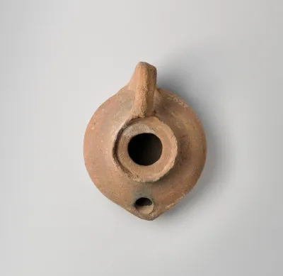 Terracotta oil lamp