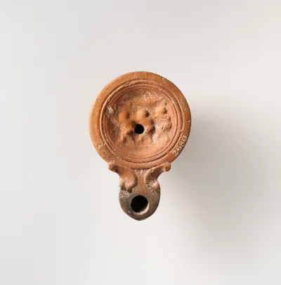 Terracotta oil lamp