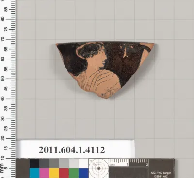 Terracotta fragment of a kylix (drinking cup)