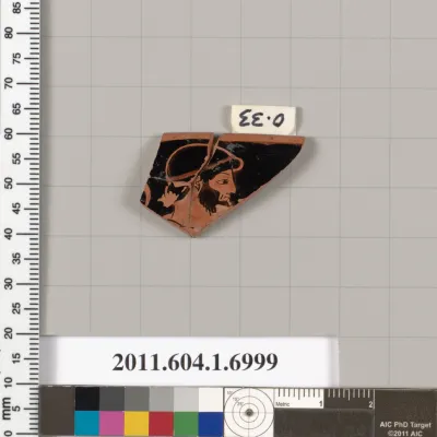 Terracotta rim fragment of a kylix (drinking cup)