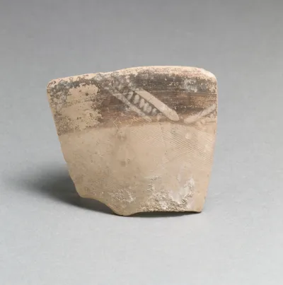Terracotta rim fragment with diagonal lines and chevrons