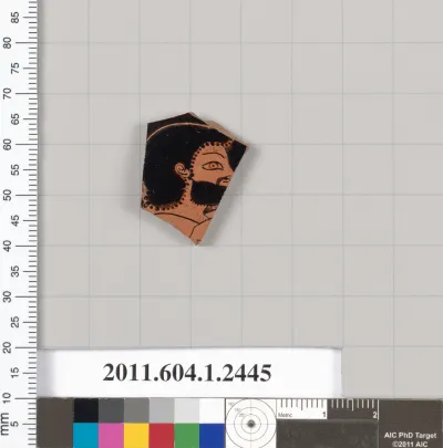 Terracotta fragment of a kylix (drinking cup)