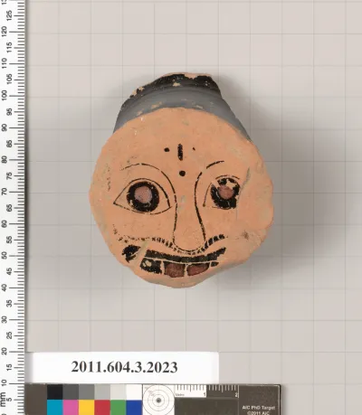 Terracotta fragment of a kylix (drinking cup)