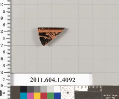 Terracotta rim fragment of a kylix (drinking cup)