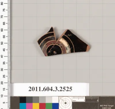 Terracotta fragment of a kylix: eye-cup (drinking cup)