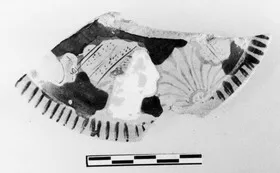 PYXIS LID, FRAGMENT (ATHENIAN, RED-FIGURE)
