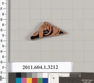 Terracotta fragment of a kylix (drinking cup)