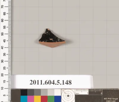 Terracotta fragment of a kylix (drinking cup)