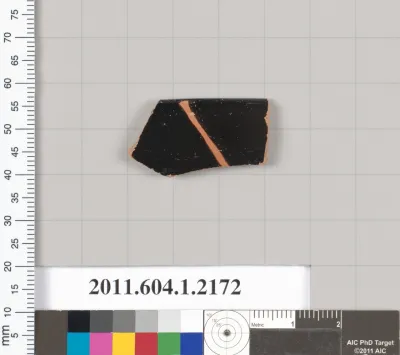 Terracotta rim fragment of a kylix (drinking cup)