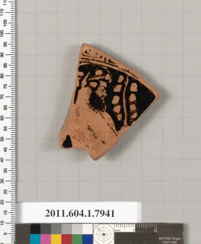 Terracotta fragment of a kylix (drinking cup)