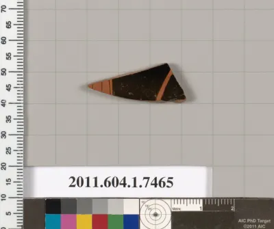 Terracotta fragment of a kylix (drinking cup)