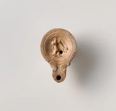 Terracotta oil lamp