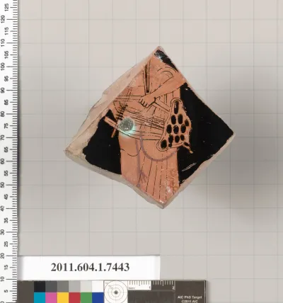 Terracotta fragment of a kylix (drinking cup)