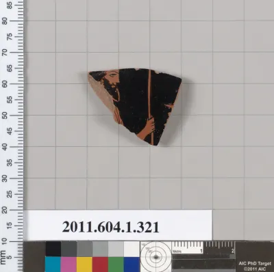 Terracotta fragment of a kylix (drinking cup)