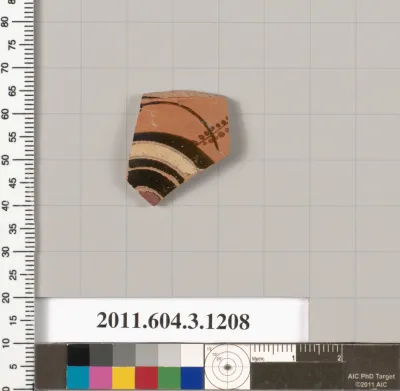 Terracotta fragment of a mastoid (drinking cup with narrow base)