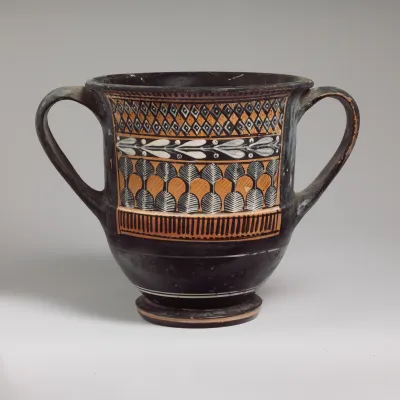 Terracotta sessile kantharos (deep cylindrical drinking cup with two handles)