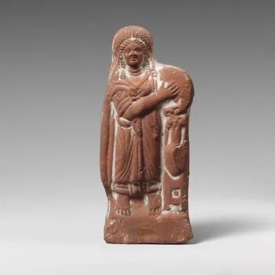 Terracotta statuette of a woman with tympanum