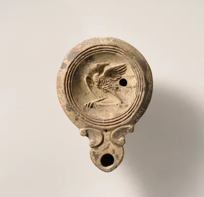 Terracotta oil lamp