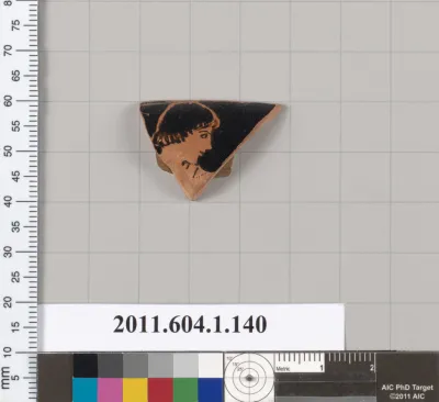 Terracotta rim fragment of a kylix (drinking cup)