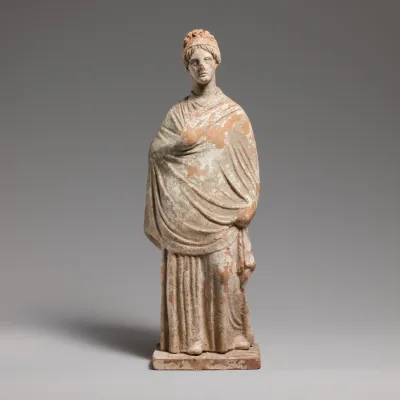 Terracotta statuette of a standing woman
