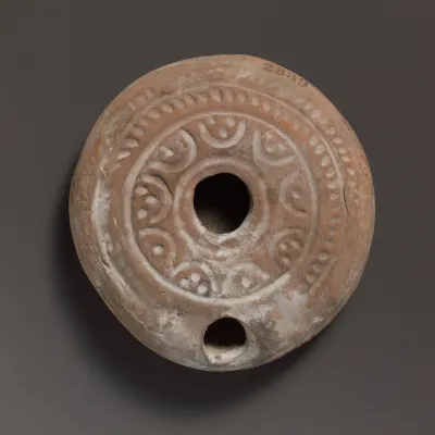 Terracotta oil lamp
