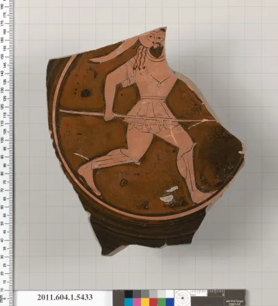 Terracotta fragment of a kylix (drinking cup)