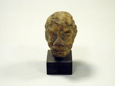 Terracotta head of an old woman