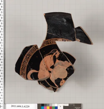 Terracotta fragment of a kylix (drinking cup)